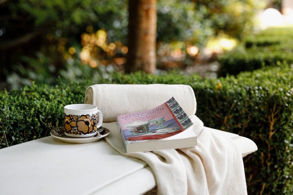 The perfect place to read a good book. By the fireplace.